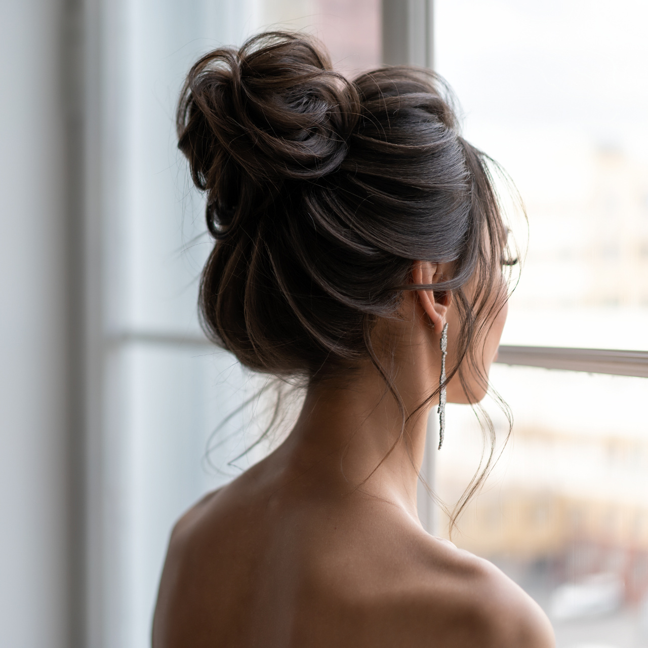 Hair do with an elegant bridal hair accessorie. wedding hairstyle for girls